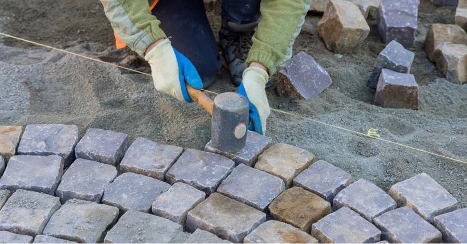 Paver installation in Southwest Florida with proper base prep for long-lasting durability. 
