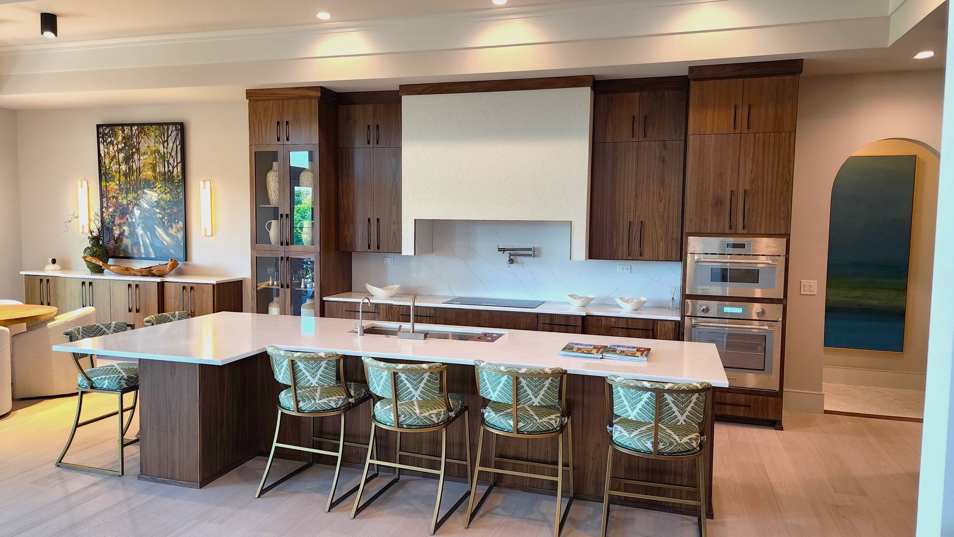 There is a large island in the middle of the kitchen.