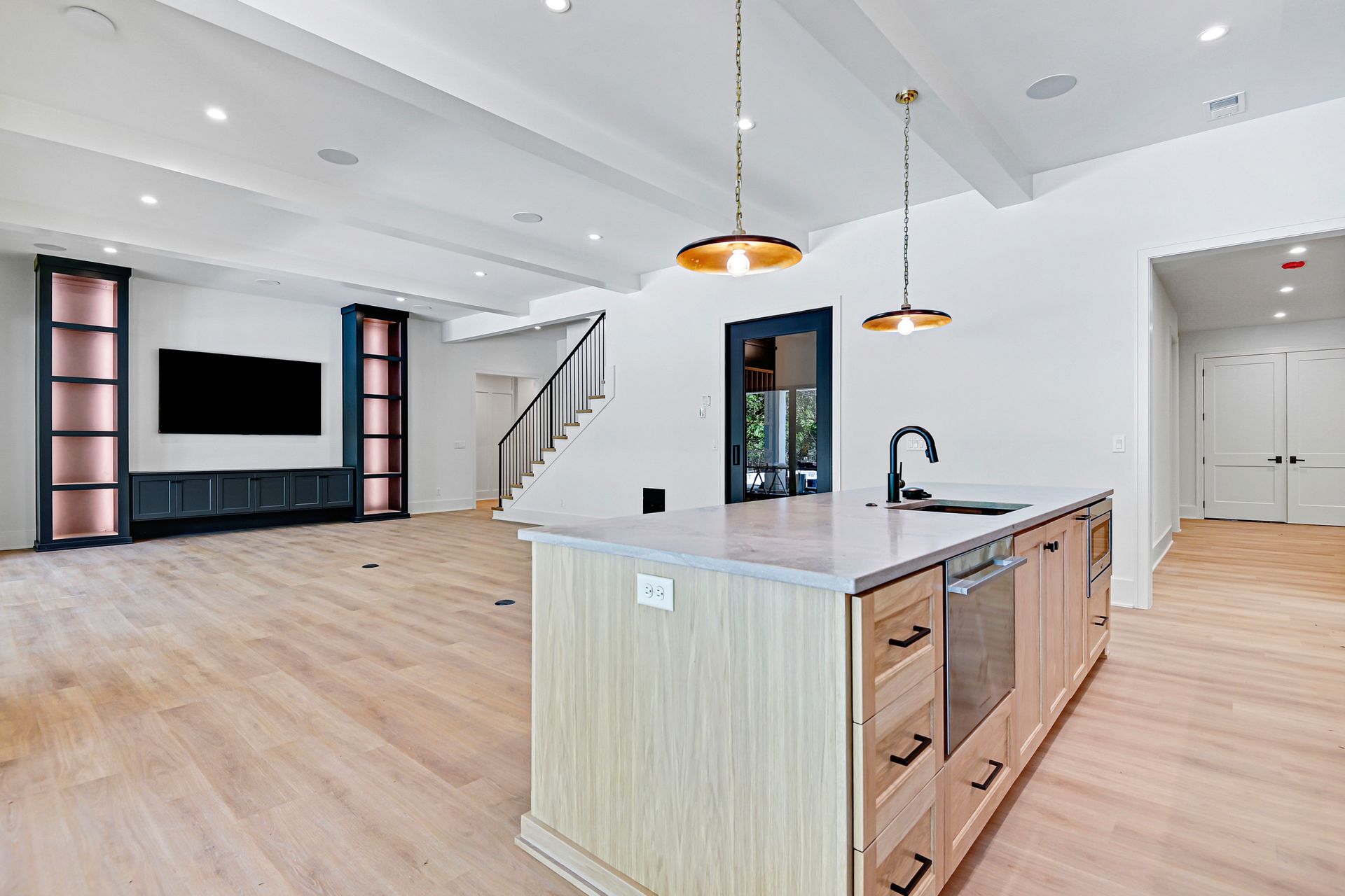 There is a large island in the middle of the kitchen.
