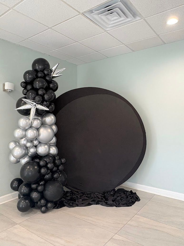 Backdrop stand with balloons