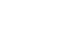 All white logo for Mason County Chamber of Commerce with wavy lines on top of the words, with