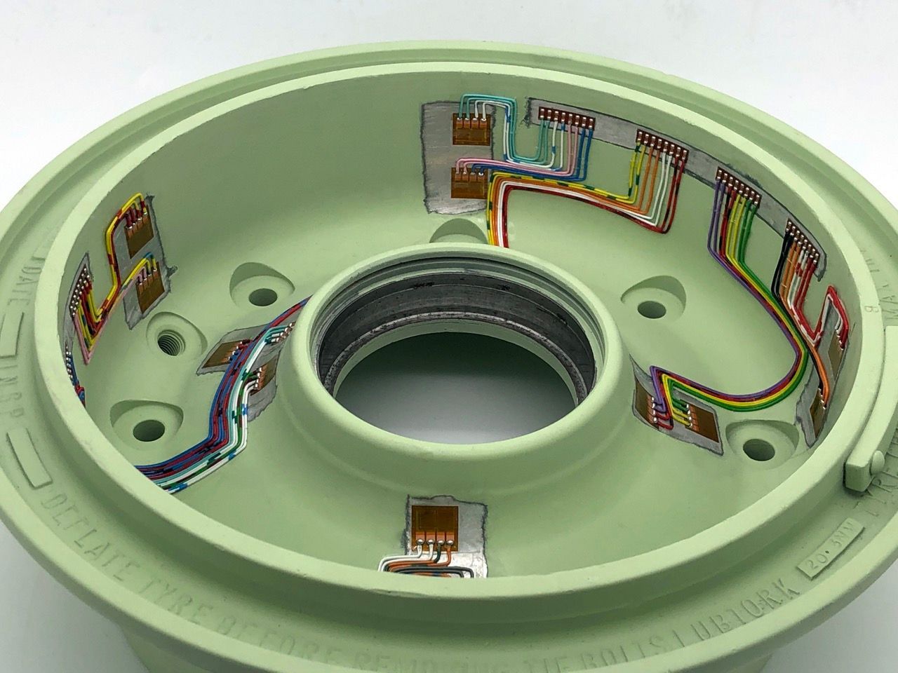 Strain gauging withing a wheel hub