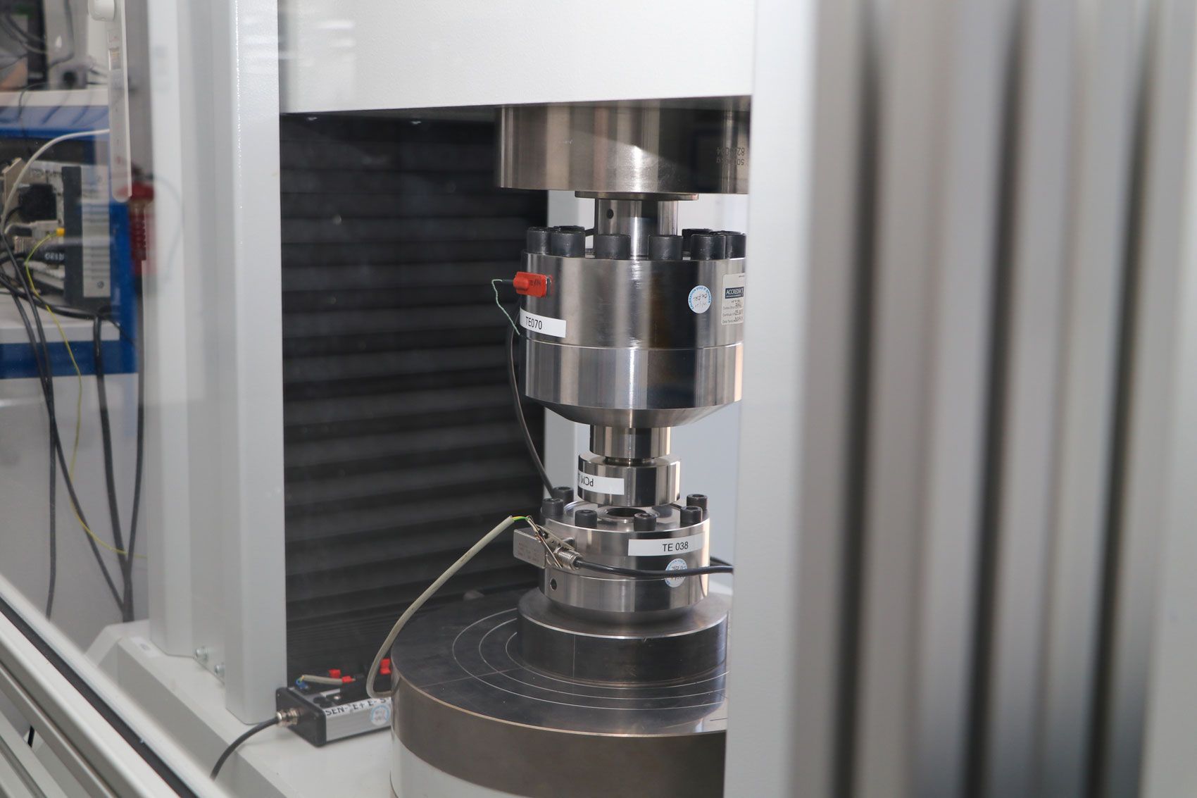 A precise load cell being calibrated