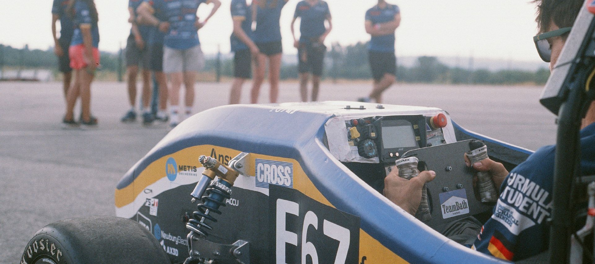 Team Bath Racing Electric Formula Student race car, steering wheel and driver.