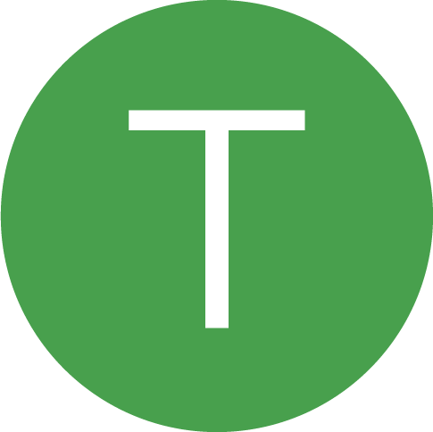 The letter T inside a green circle