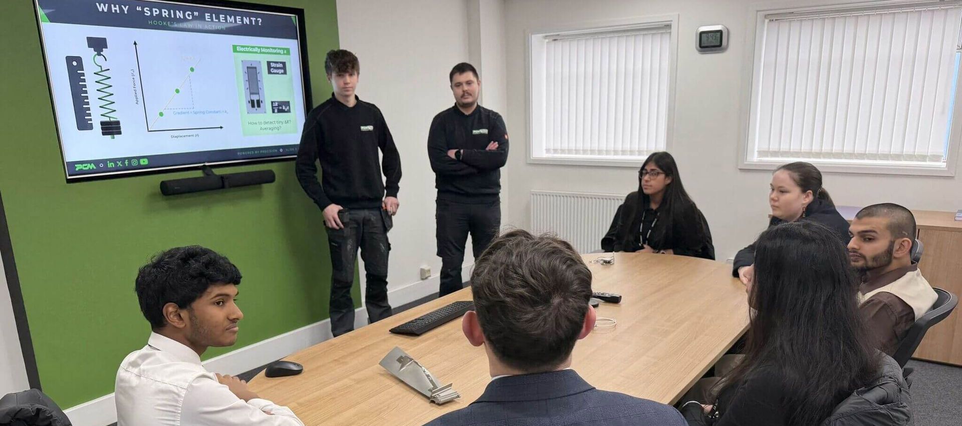 Early-career engineers at Procter & Chester answers students load measurement questions from WMG Academy.