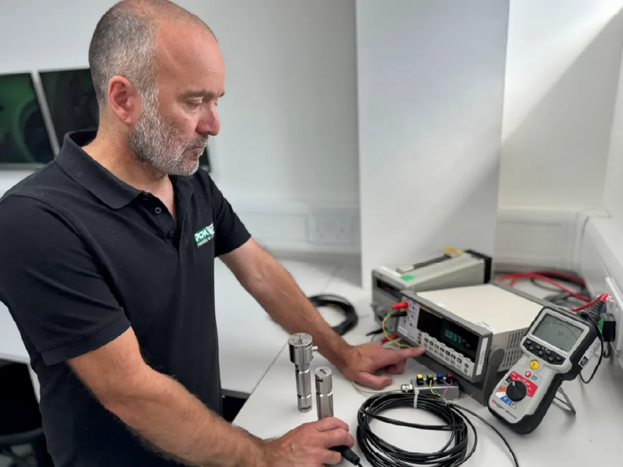 Jason Horne, Goods In/Out Inspector from Procter & Chester Measurements working inside his office