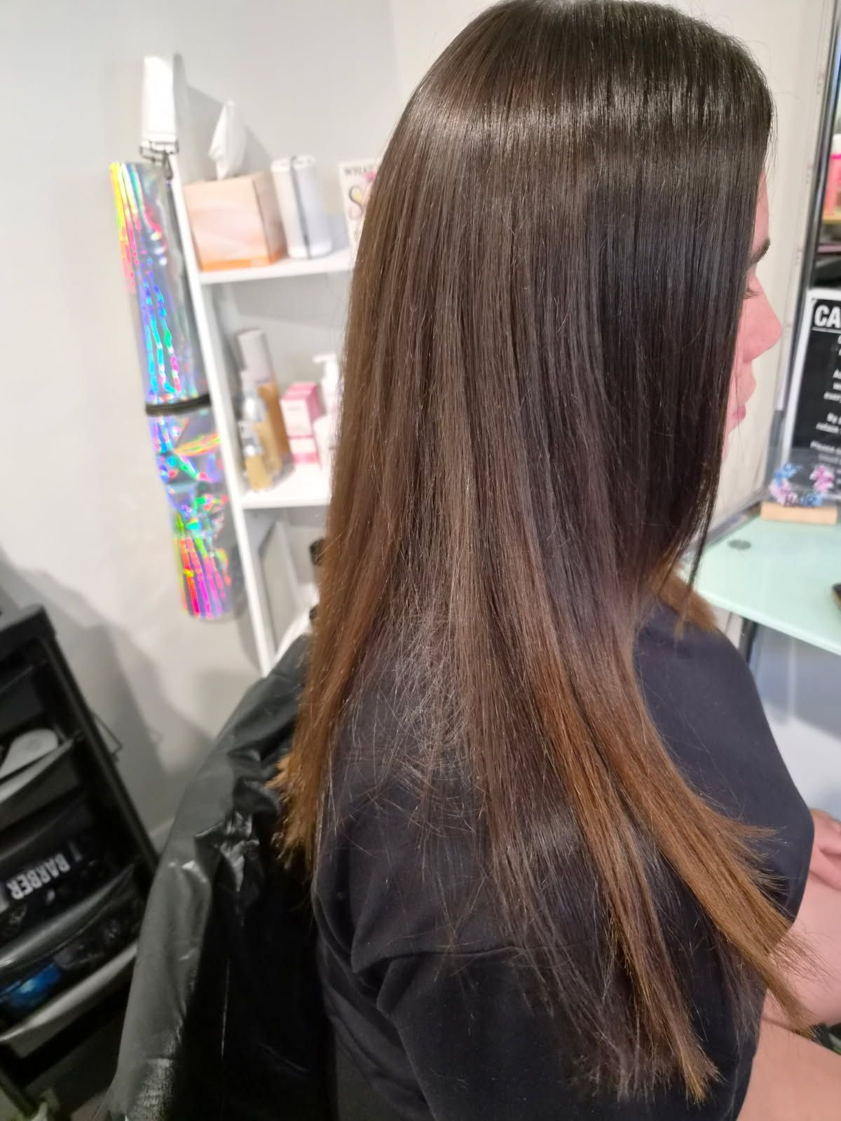 After Nanoplasty treatment showing smooth glossy hair