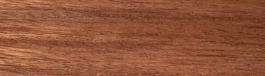Close-up of reddish-brown wood grain with visible texture.