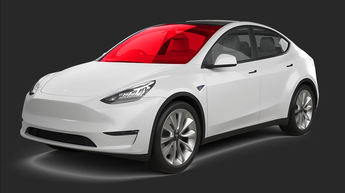 A white tesla model s is sitting on a white surface.