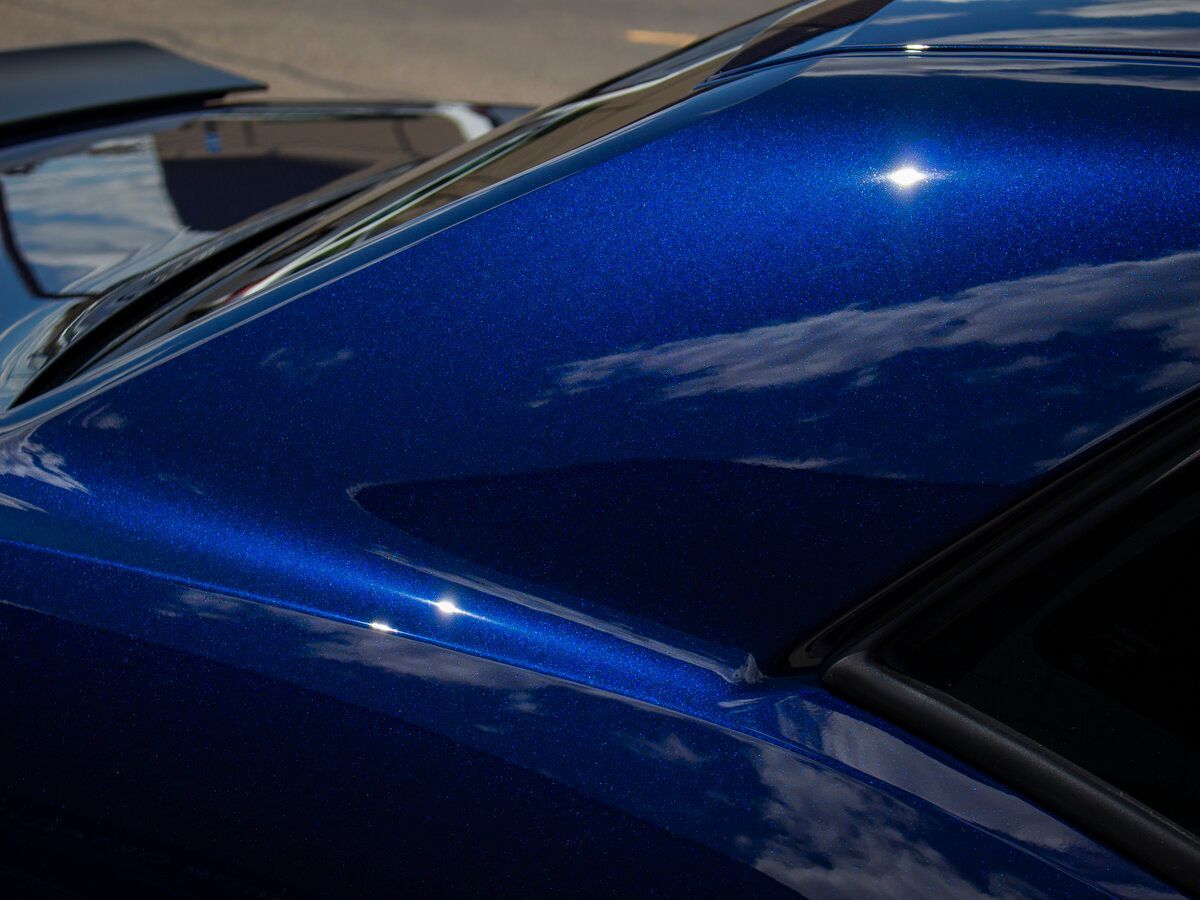 ceramic coating on a blue car