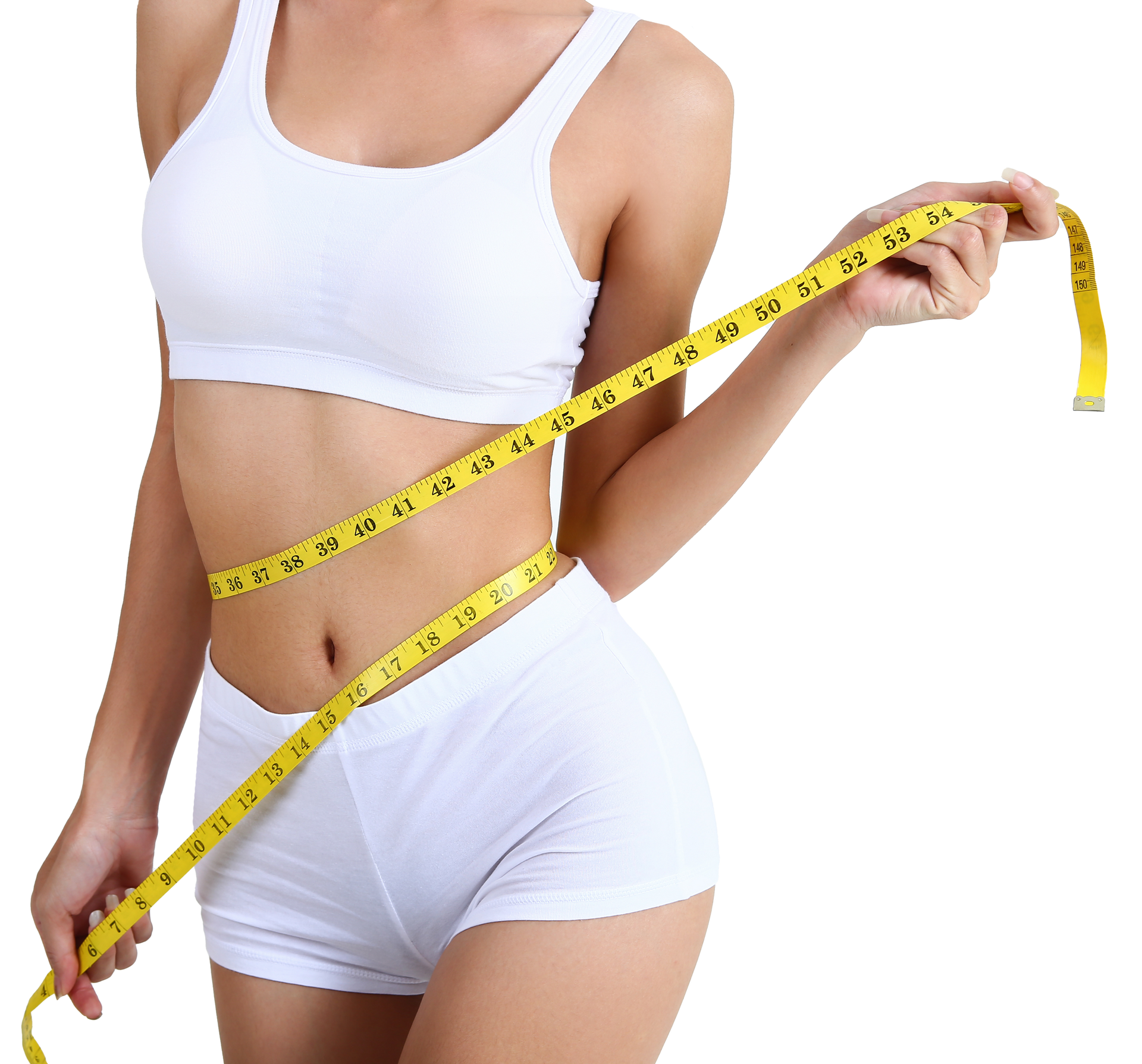 A woman is measuring her waist with a tape measure