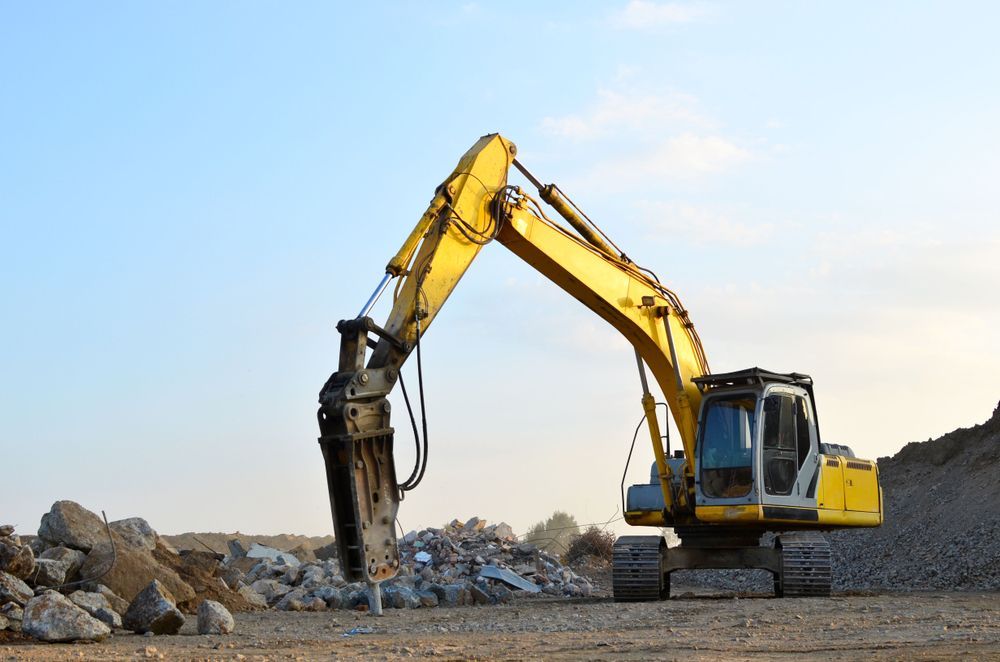 An Excavator with A Hydraulic Breaker Attachment — CartEX in Mornington, TAS