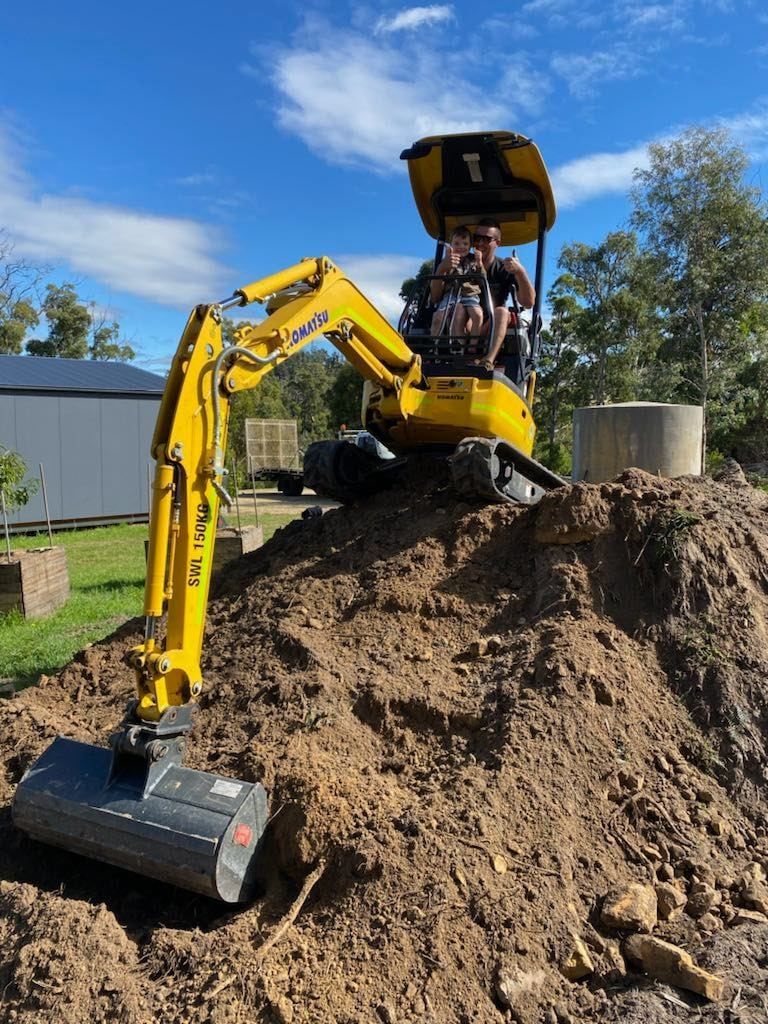 An Excavator on Top of A Large Dirt Pile — CartEX in Mornington, TAS