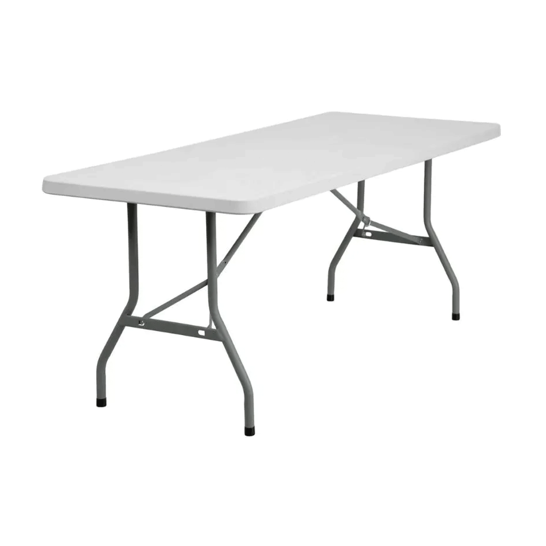 White folding plastic table with metal legs on a plain background