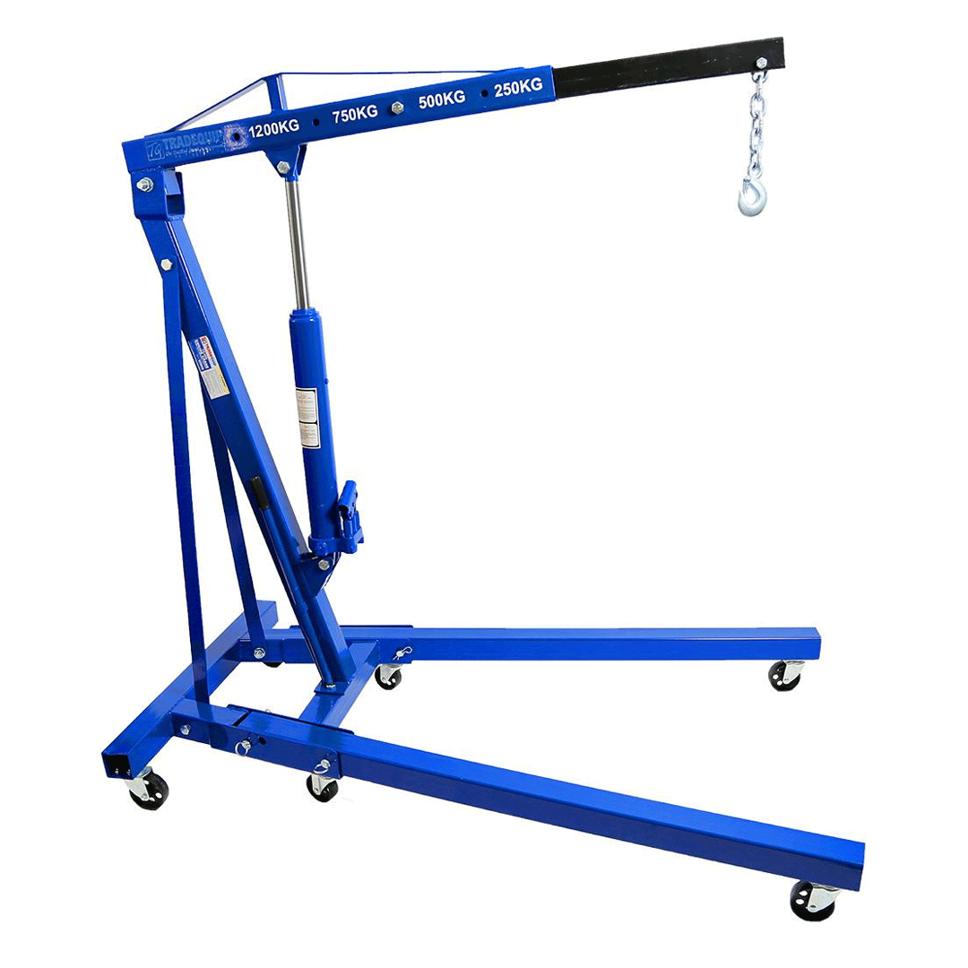 Blue hydraulic shop crane with wheels and lifting hook on a white background