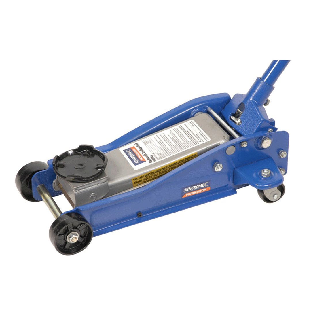 Blue hydraulic floor jack with black wheels and lifting handle on a white background