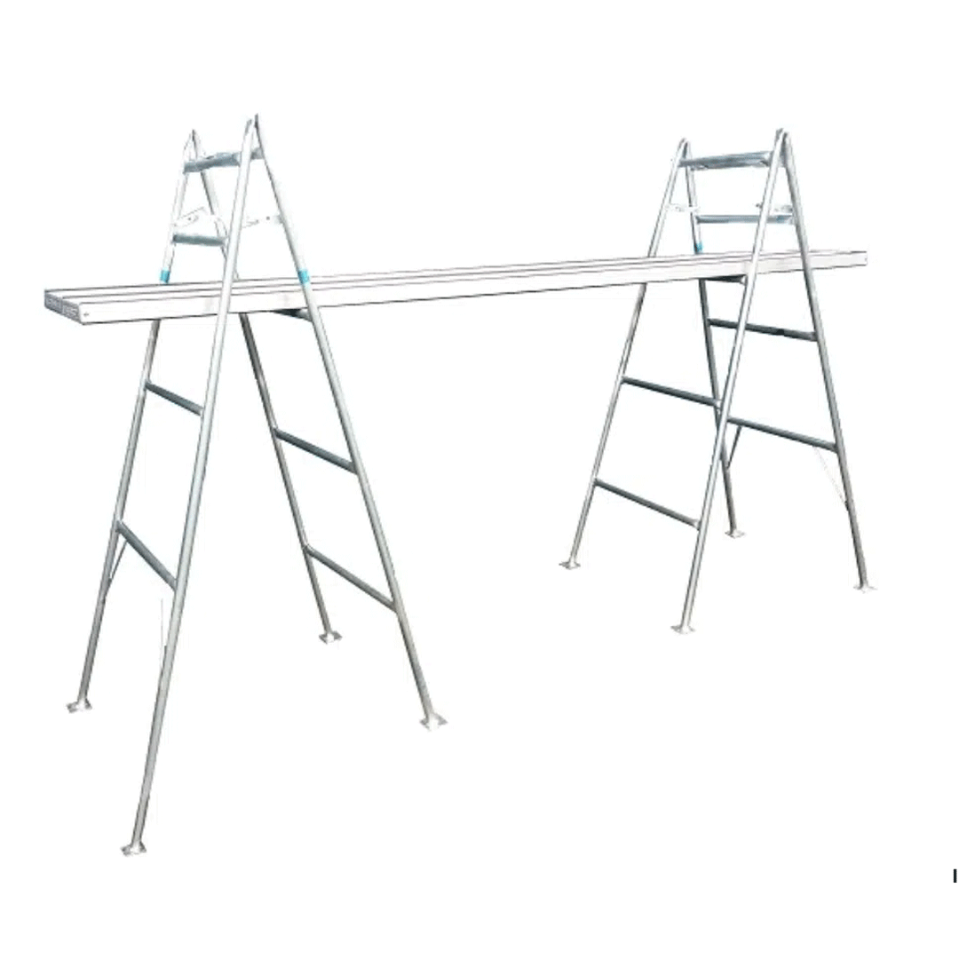 Two aluminum trestles supporting long metal planks on a white background