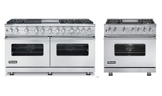 Two stainless steel ovens are sitting next to each other on a white background.