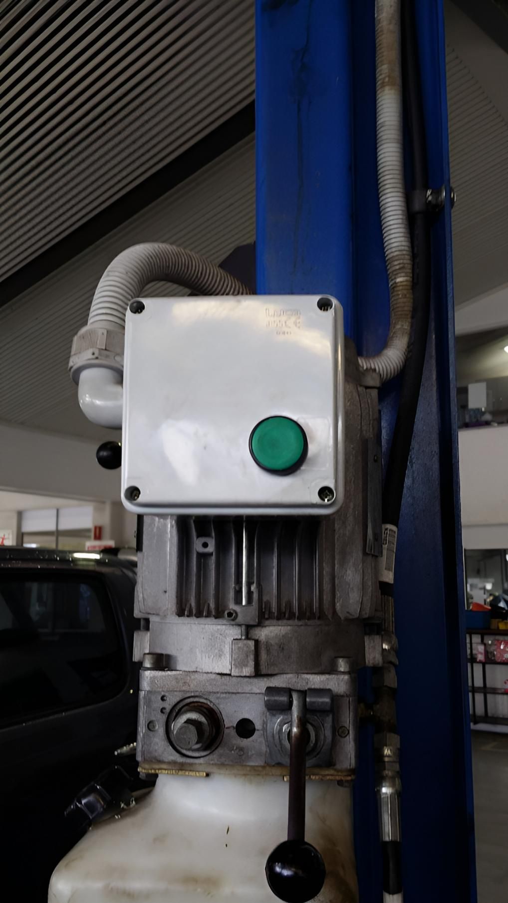 A Close Up of a Machine With a Green Button on It — Reilly Electrical Services in Yandina, QLD