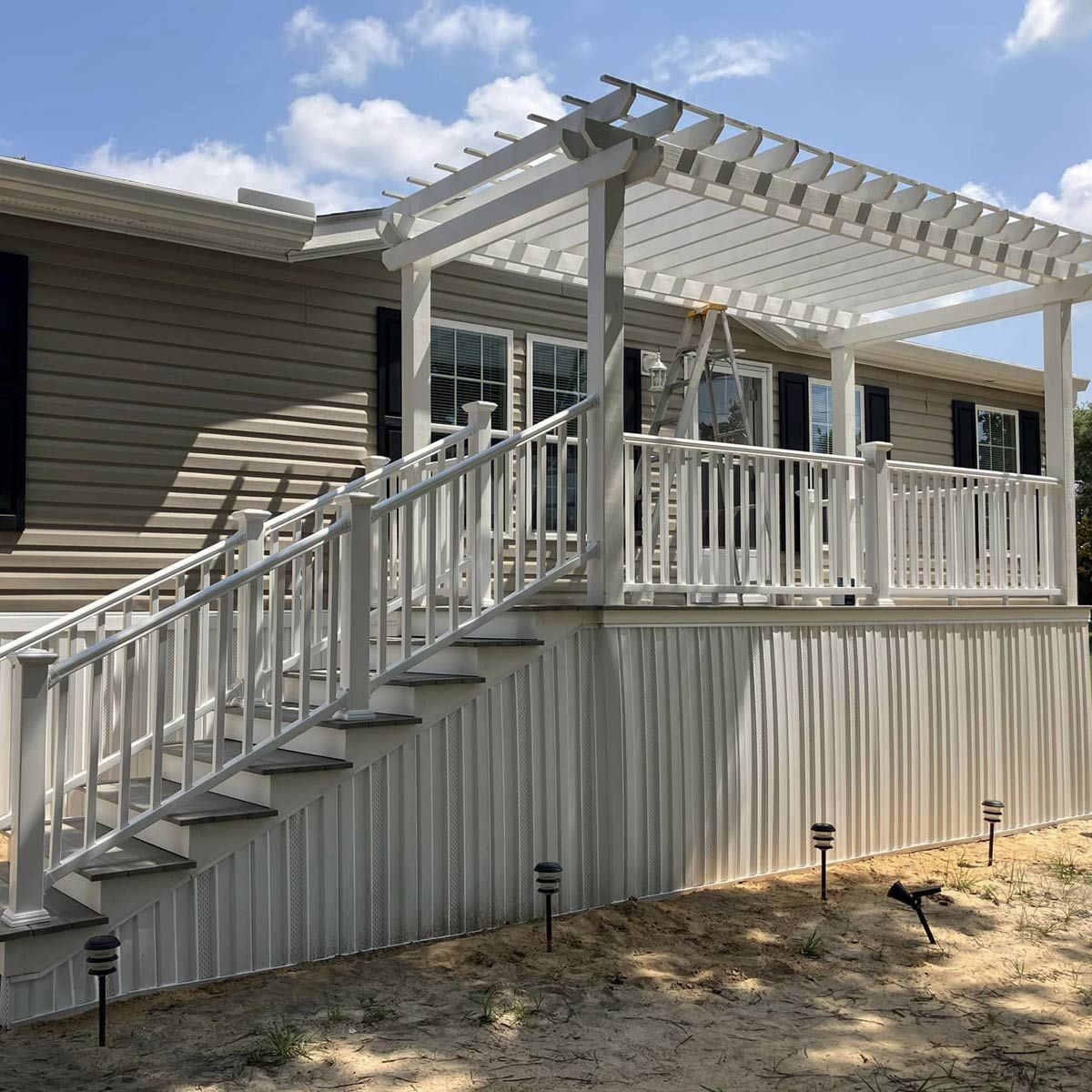 A house with a pergola — Windemere, FL — Valor Homes Construction A house with a pergola — Windemere, FL — Valor Homes Construction