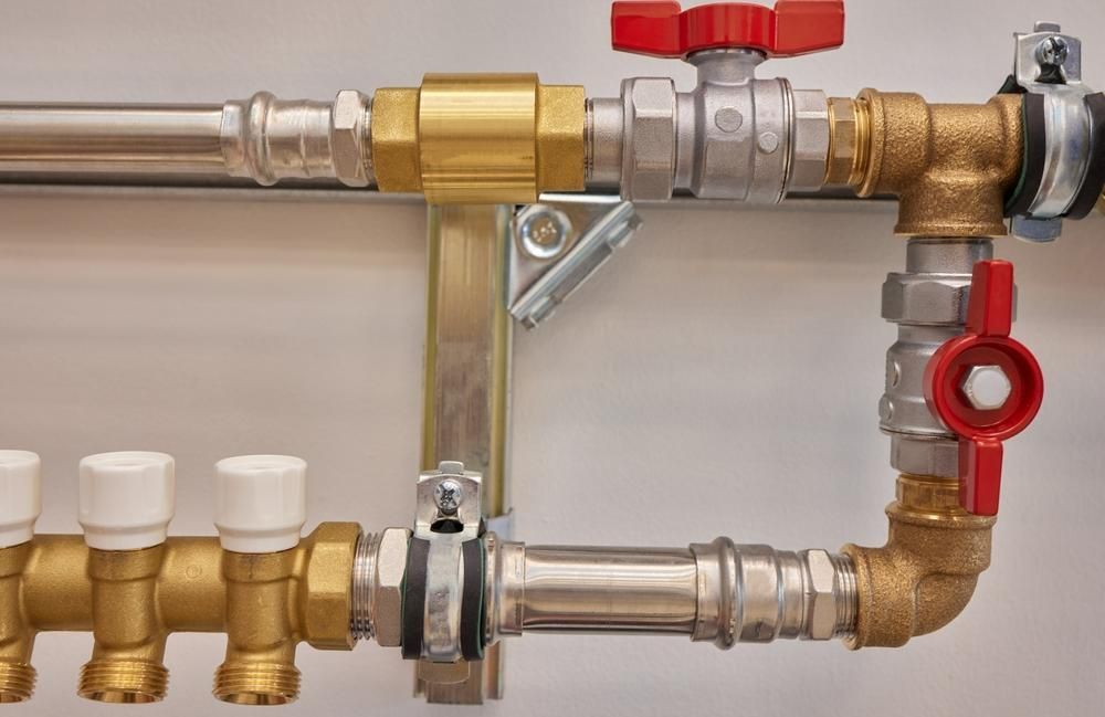 Plumbing Pipes and Valves in Brass and Silver — David McNeill Plumma (Gas Specialist) In Cessnock, NSW