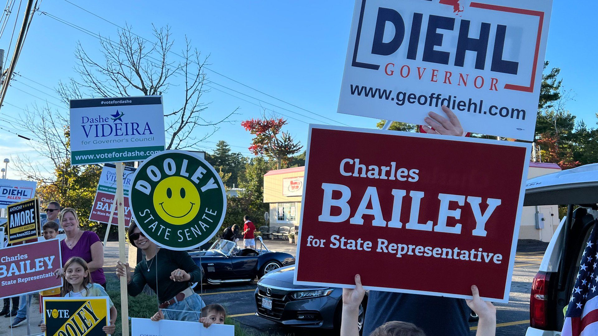 people holding signs