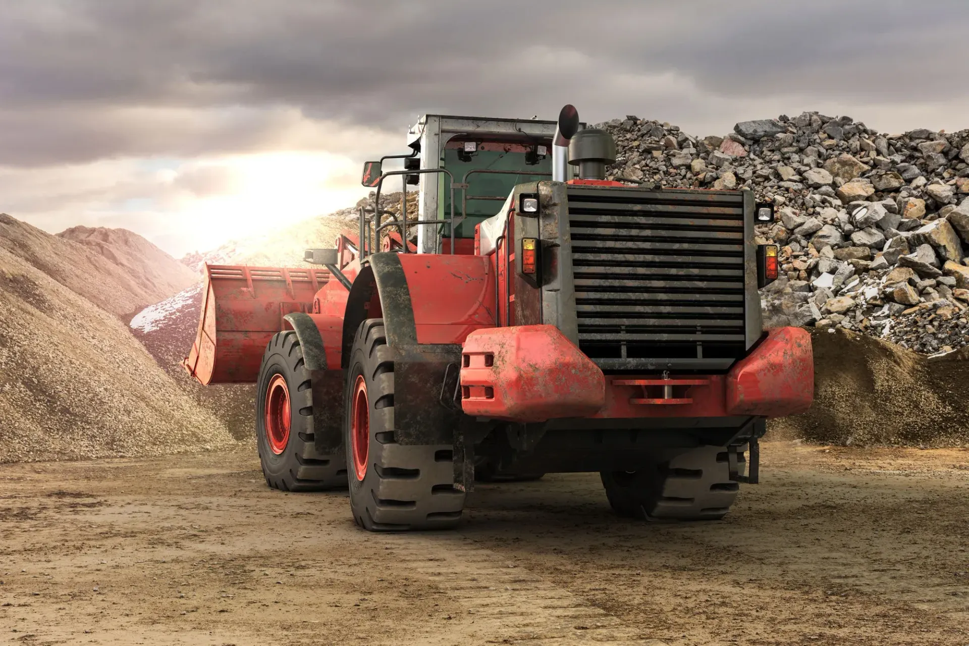 Red Front-end Loader on Dirt in Quarry Setting — Cairns Tyre Specialists In Cairns City, QLD