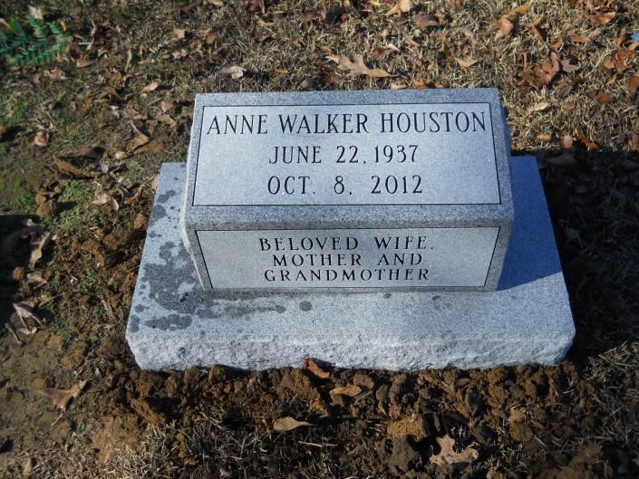 Gravestone for Anne Walker Houston with dates June 22, 1937 and Oct. 8, 2012 in a grassy cemetery.