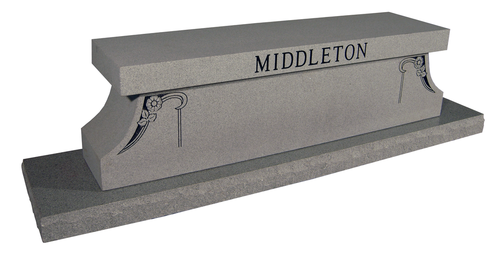 Gray granite memorial monument with the name “MIDDLETON” engraved on top.