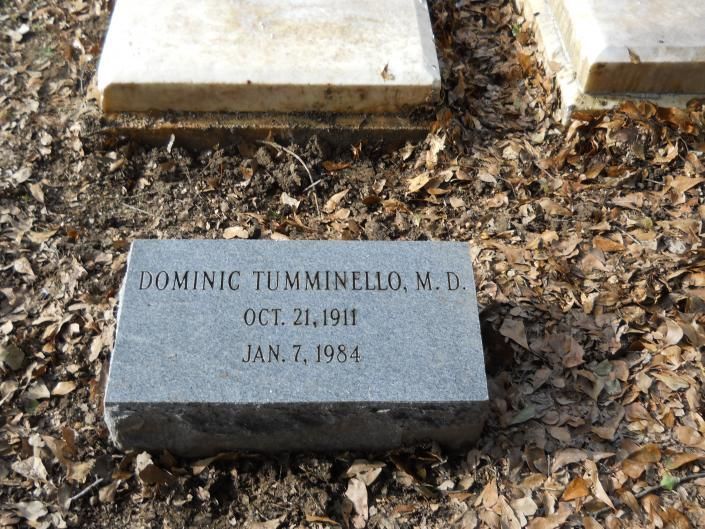 Gravestone for Dominic Tumminello, M.D., with October 21, 1912, and January 1, 1985 engraved.