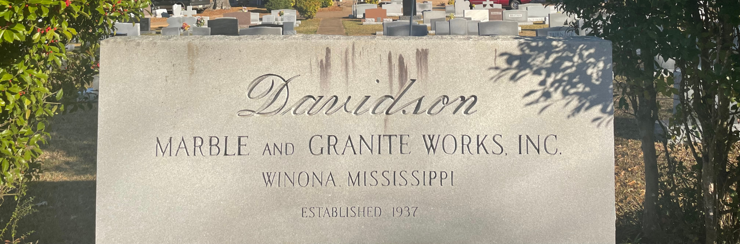 Gravestone for Donator, Marble City Granite Works Inc., in a cemetery background