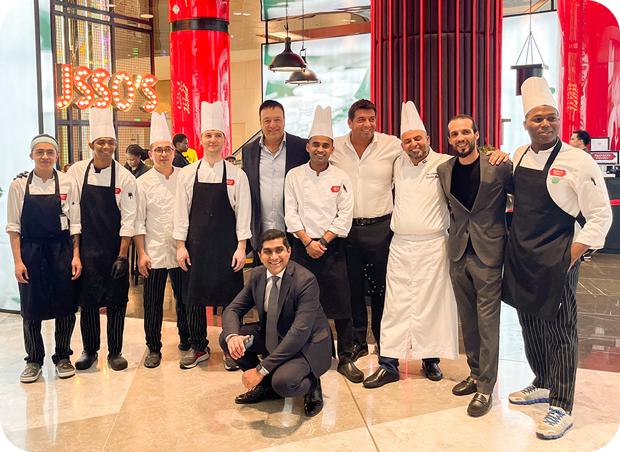 A group of chefs and restaurant staff.