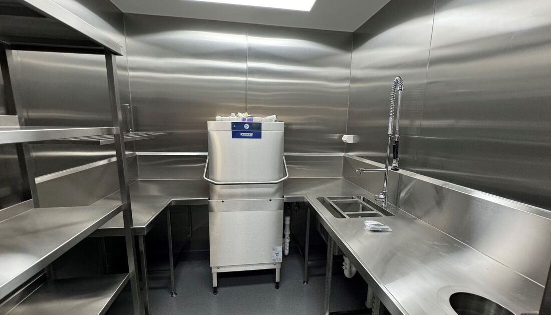 A Stainless Steel Kitchen with A Dishwasher, Sink, and Shelves — Townsville Stainless Steel in Garbutt, QLD
