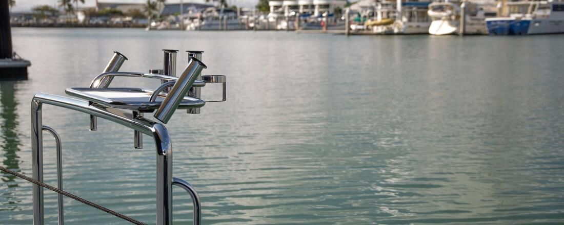 A Boat Is Docked in A Harbor with Boats — Townsville Stainless Steel in Garbutt, QLD