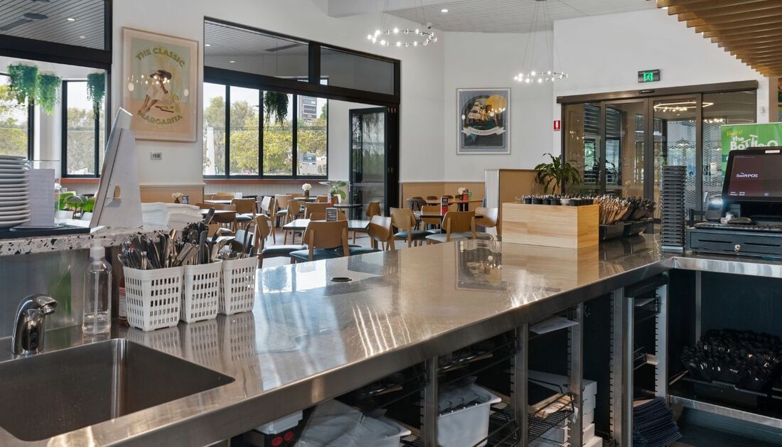A Kitchen with A Sink and A Counter in A Restaurant — Townsville Stainless Steel in Garbutt, QLD