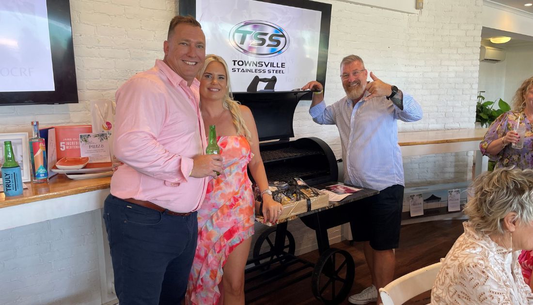 A Group of People Are Standing Next to Each Other in A Room — Townsville Stainless Steel in Garbutt, QLD A Group of People Are Standing Next to Each Other in A Room — Townsville Stainless Steel in Garbutt, QLD