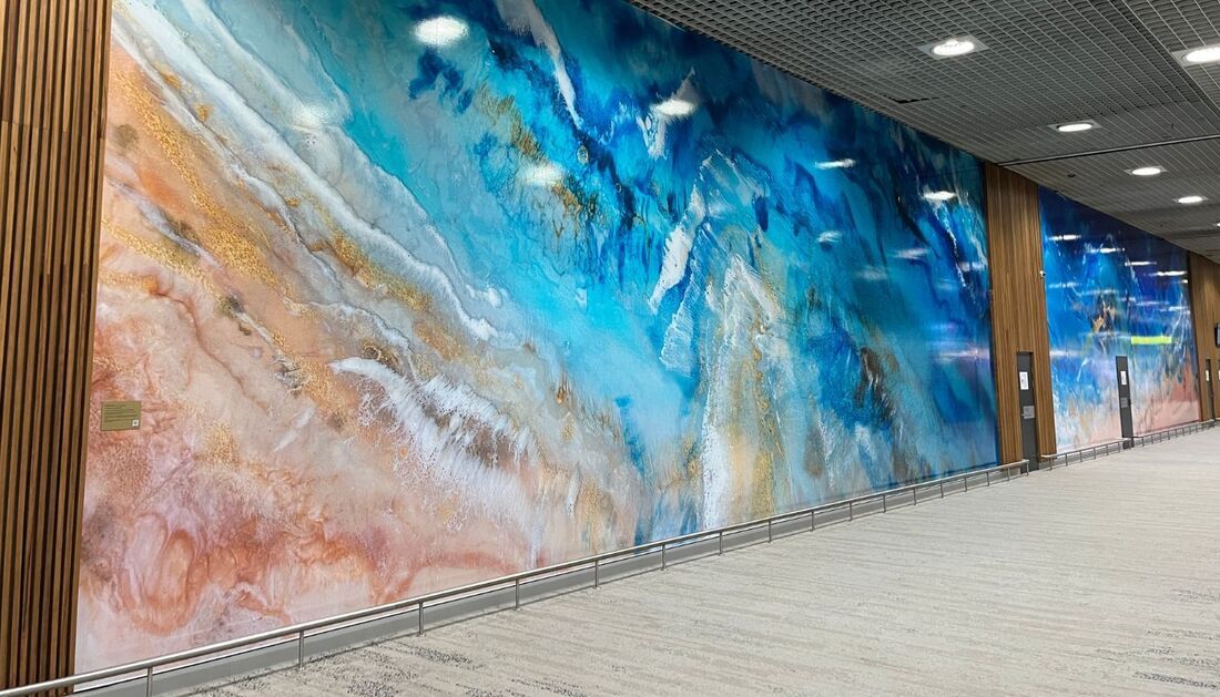 There Is a Large Painting on The Wall in The Hallway — Townsville Stainless Steel in Garbutt, QLD There Is a Large Painting on The Wall in The Hallway — Townsville Stainless Steel in Garbutt, QLD