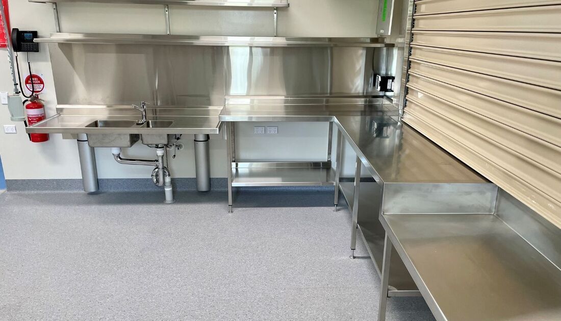 A Kitchen with Stainless Steel Appliances and A Sink — Townsville Stainless Steel in Garbutt, QLD A Kitchen with Stainless Steel Appliances and A Sink — Townsville Stainless Steel in Garbutt, QLD