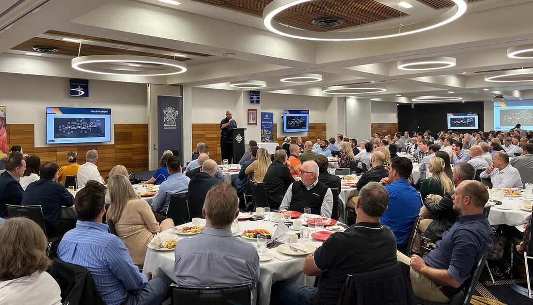 A Large Group of People Are Sitting at Tables in A Large Room — Townsville Stainless Steel in Garbutt, QLD A Large Group of People Are Sitting at Tables in A Large Room — Townsville Stainless Steel in Garbutt, QLD
