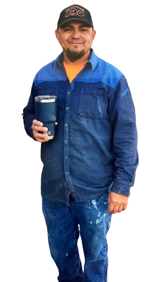 A man in a blue shirt is holding a blue cup
