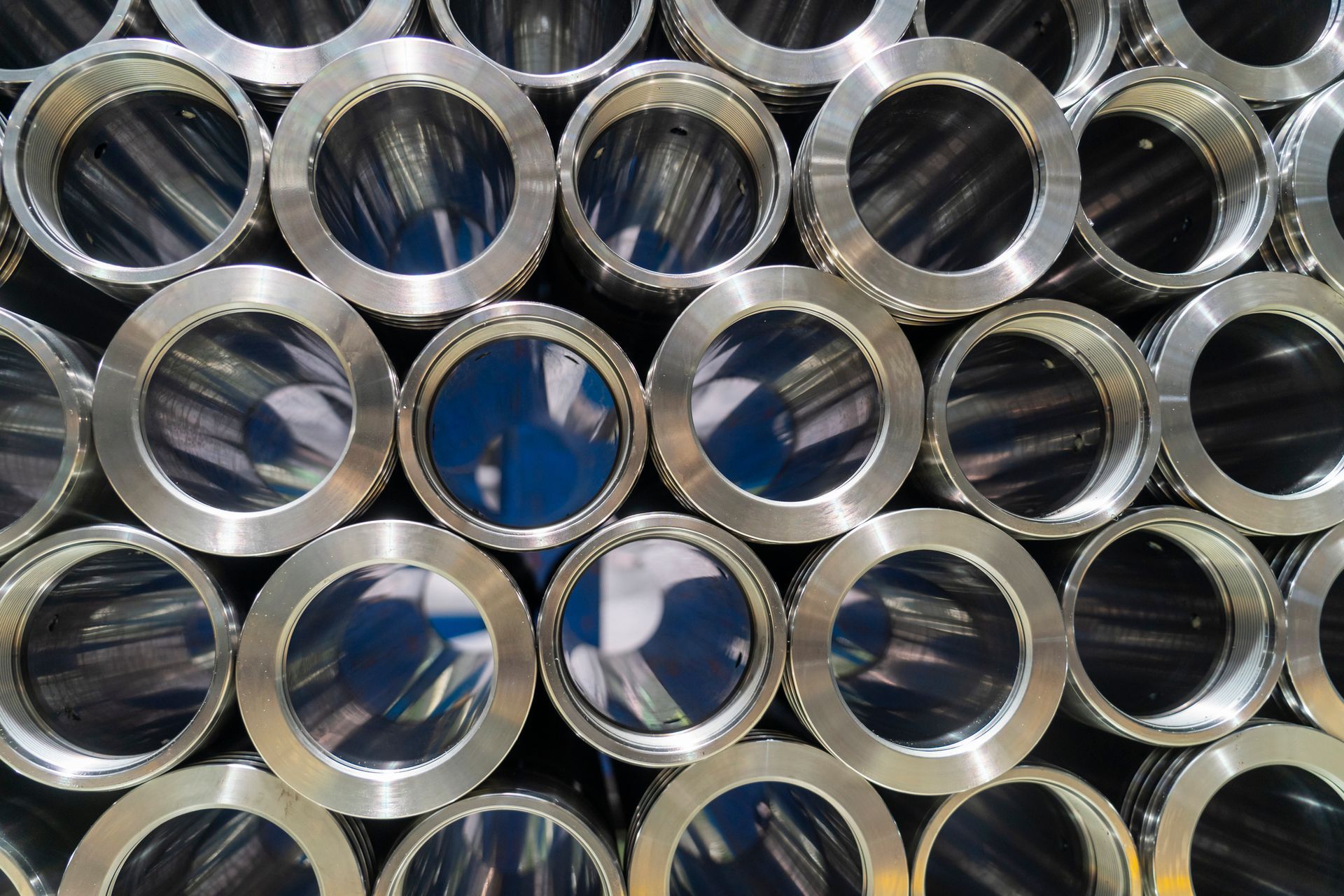 Metal pipe fittings during machining.
