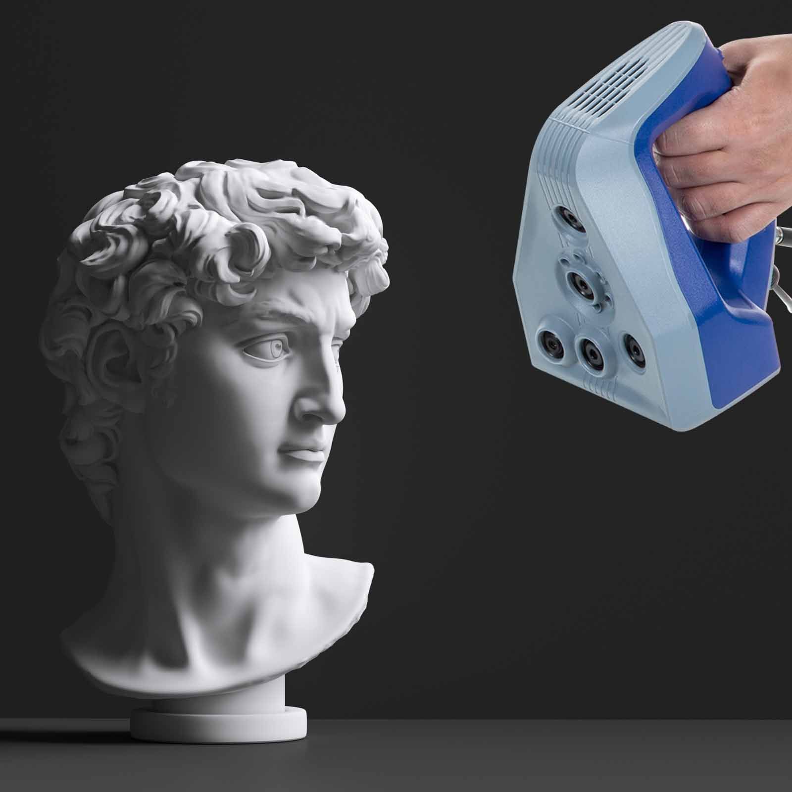A statue of a man 's head  being scanned with an Artec 3d scanner