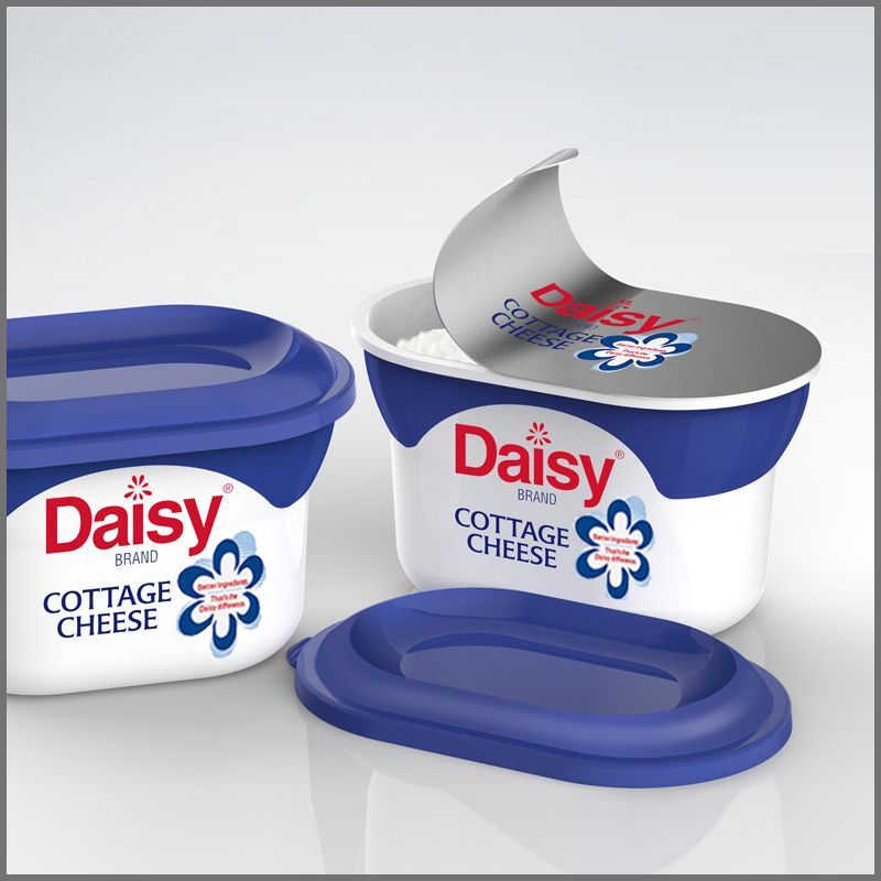 Photo realistic rendering of a design concept for a container of daisy cottage cheese with blue lids