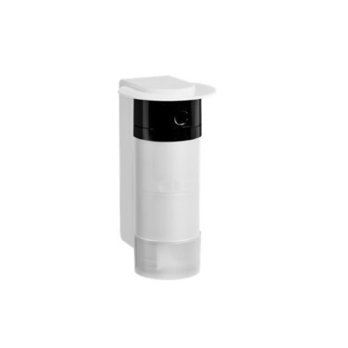 Distributeur mural blanc avec dessus noir et réservoir inférieur transparent sur fond uni