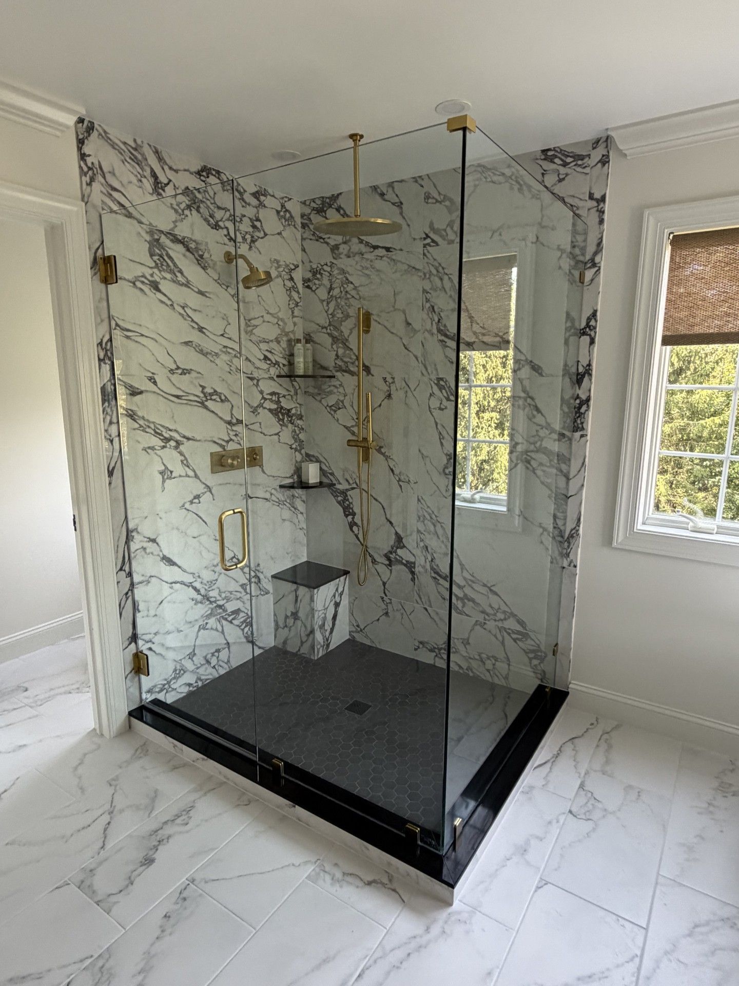 Glass shower enclosure