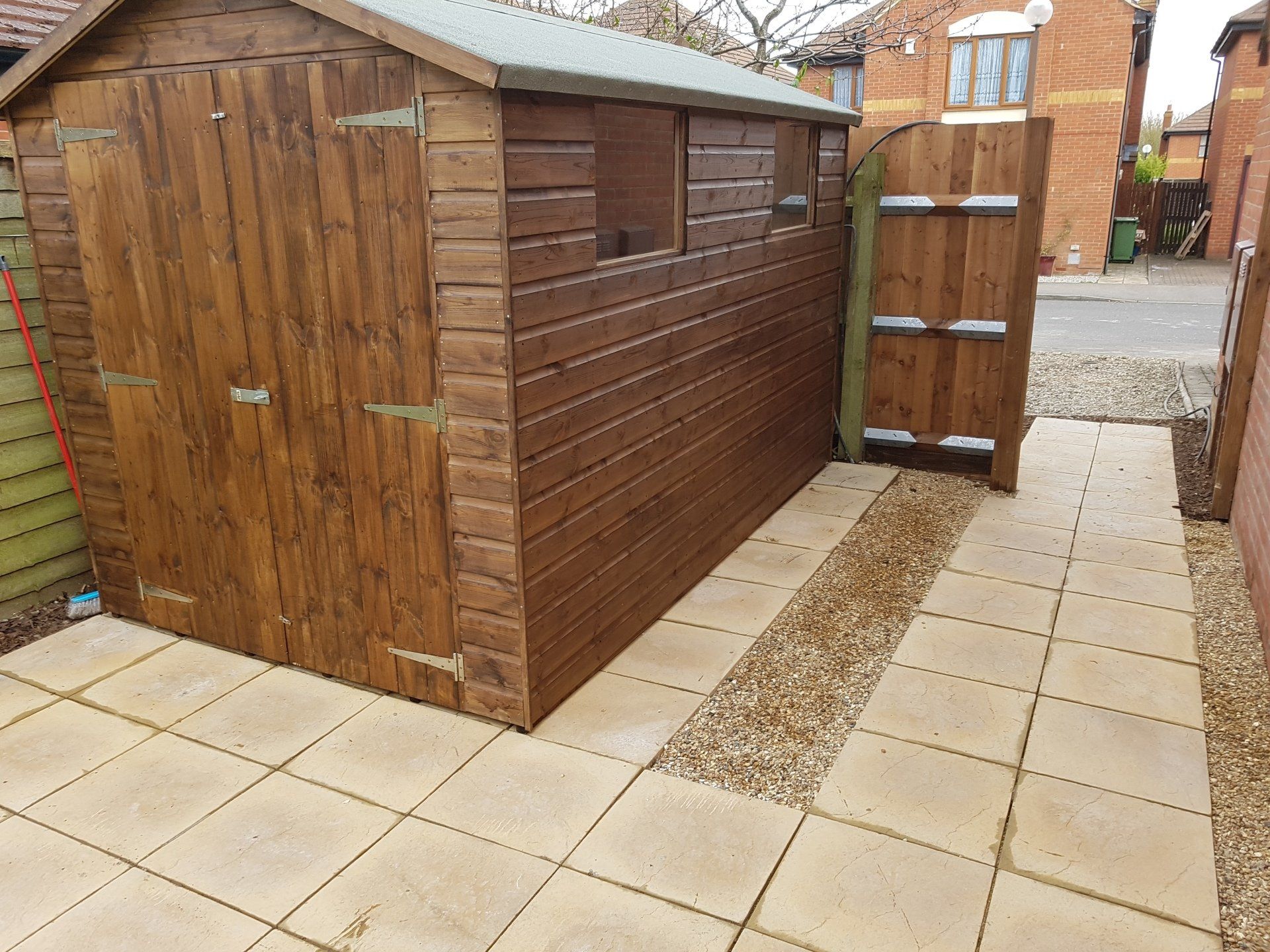 Large white shed with double doors