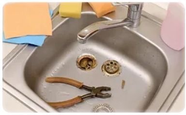 RV sink with pliers in it