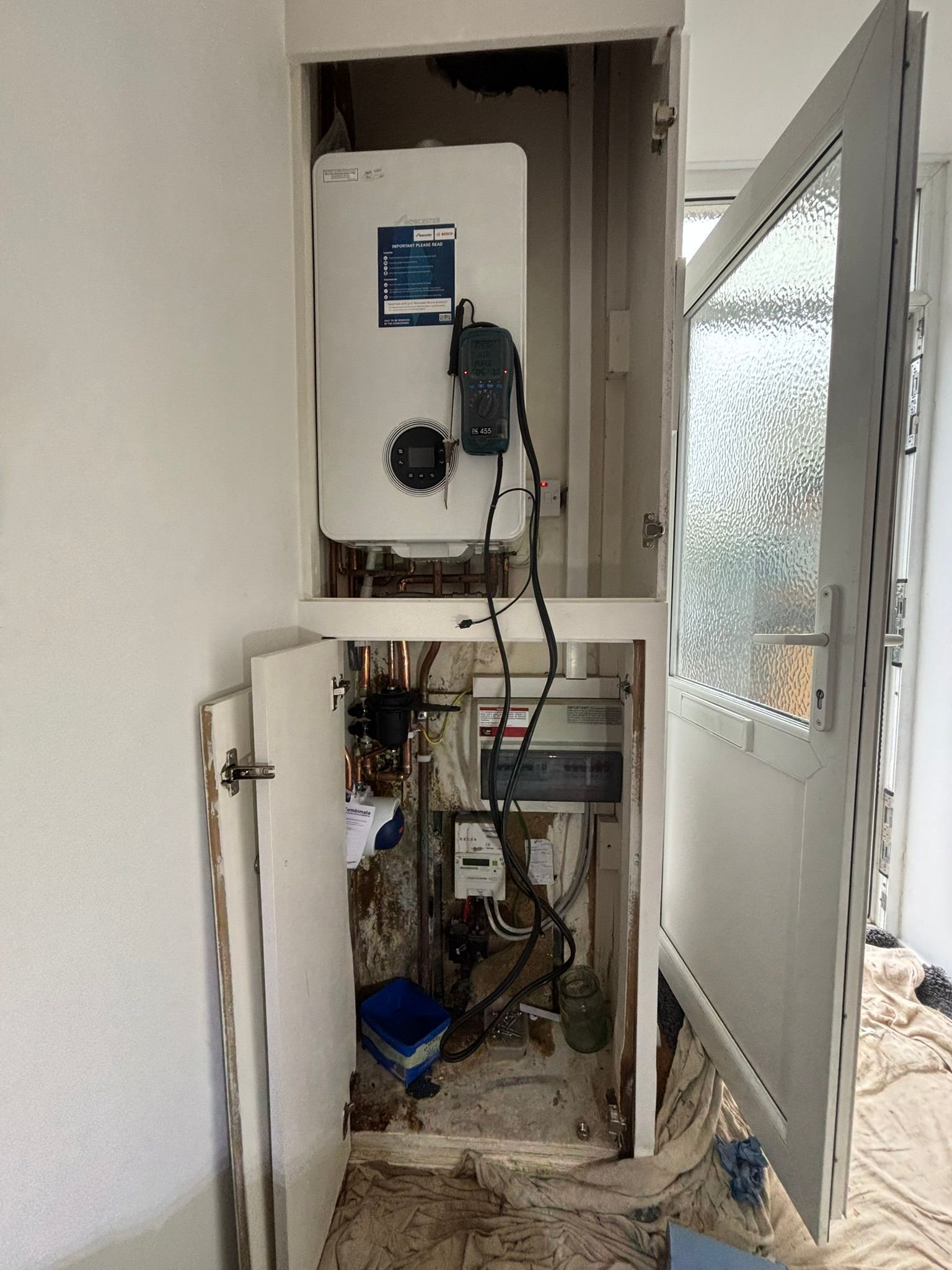 Boiler installation in cupboard