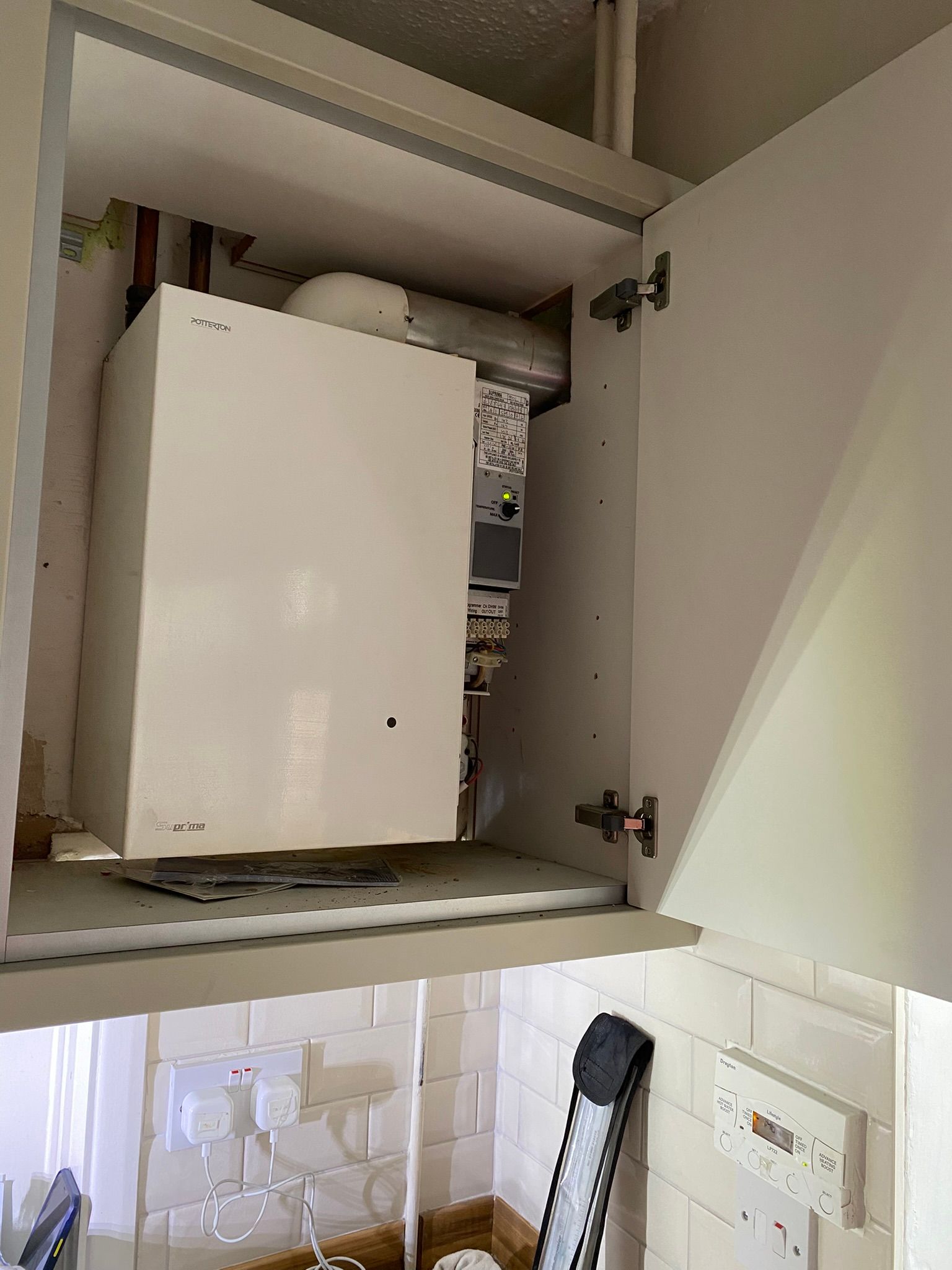boiler installation within a cupboard